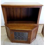 Graham Swan Man Duncalf - Two oak L shaped corner entertainment units, with moulded top, paneled