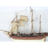 C20th hand built wooden model of a three masted schooner, L73cm, H65cm