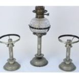Late C19th Hukin and Heath silver plated oil lamp and matching candleholders, profusely embossed