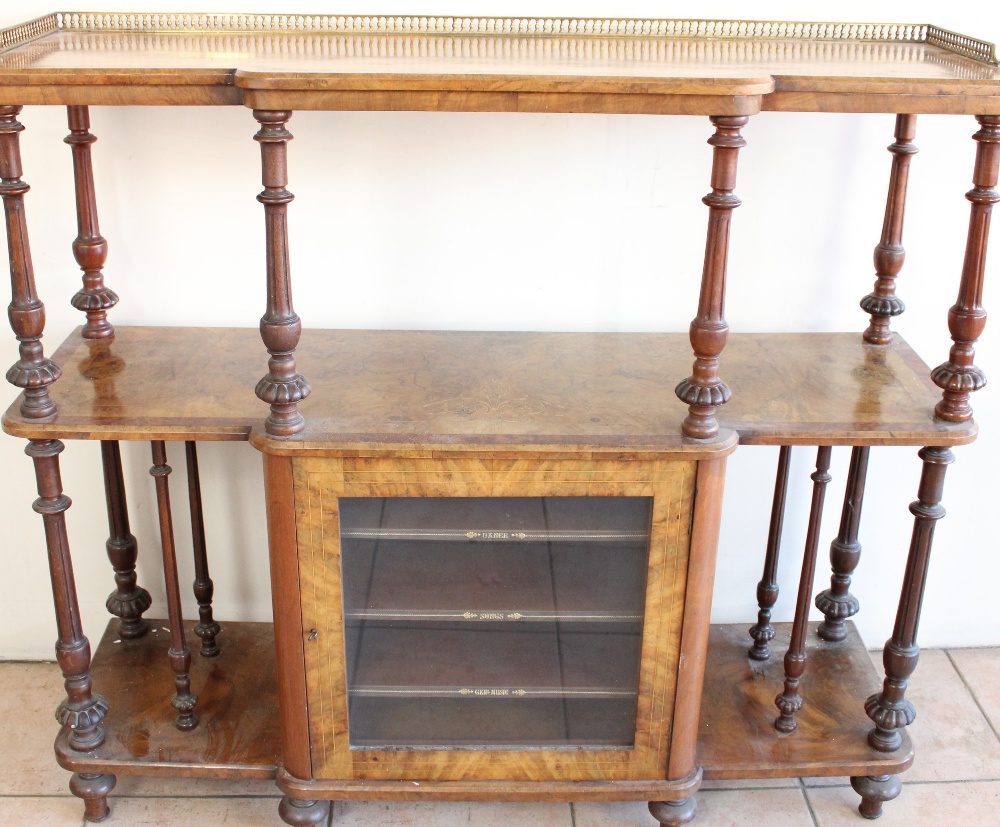 C19th burr walnut three tier what-not music cabinet, on slender fluted supports, inlaid baroque