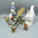 Royal Copenhagen model of a Goose girl, painted no. 527, H24cm, Beswick Robin no. 980, H8cm, Beswick