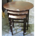 C20th nest of three mahogany occasional tables, with scalloped edges, largest W59cm D41cm H57cm