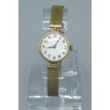 Swiss early C20th ladies 9ct gold cased wristwatch with enamelled dial(a/f) snap on bezel with