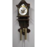 Late C20th Dutch style oak cased chiming wall clock with break arch dial, applied spandrels and