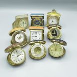 Rhythm world time travel alarm clock in clam shell leatherette case and a collection of other