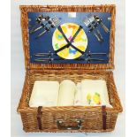 Antler picnic hamper containing settings for four including cups, cutlery, flask, plates, etc.,