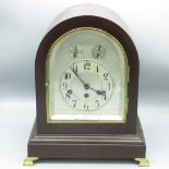 Junghans c20th arched top mahogany cased mantle clock, brass framed glazed door enclosing silvered