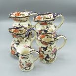 Five graduated Mason's Ironstone "Mandalay" Hydra type jugs, H16cm max (5)