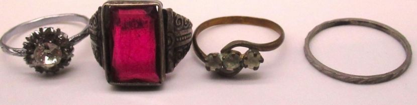Continental silver ring set with red glass, stamped 800, a yellow metal c19th style cameo brooch,