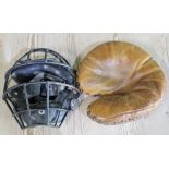 Vintage American baseball backstop catchers mitt and face guard with chin and head padding