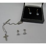 9ct white gold crucifix necklace set with diamonds, on 9ct white gold chain, both stamped 375, a