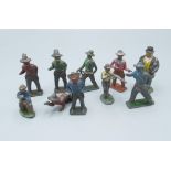Small collection of lead cowboys in different poses, pistol shooting, rifle shooting, prone position