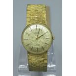 1960s Rotary gold plated hand wound wristwatch, signed gold bark effect dial with applied indices on