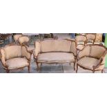 Late C19th Louis XV style walnut salon suite comprising two seater canape with scrolled frame and