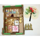 Seven miniature bisque figures of Chinese elders, porcelain floral table place settings including
