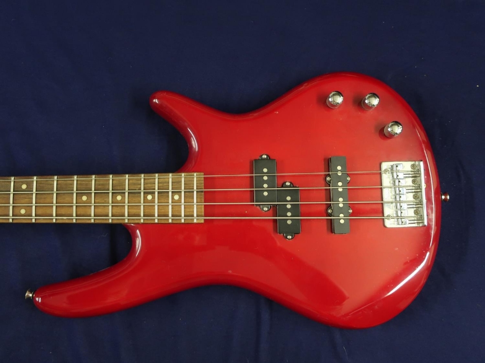 Electric bass guitar with solid body in red finish, with maple neck marked Ibanez on head stock, - Image 2 of 3