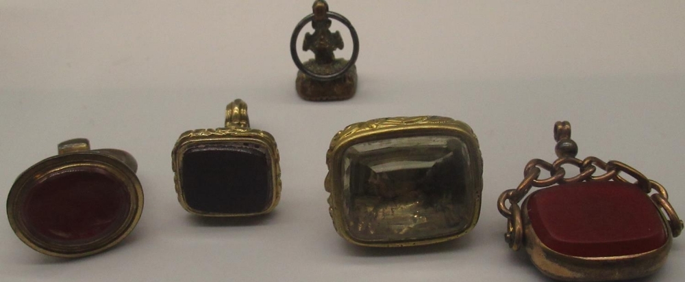 Four Victorian and later seal fobs, two set with coloured stones, one set with intaglio portrait,