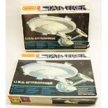 Two Matchbox Star Trek U.S.S. Enterprise PK-5110 plastic model kits with fibre optic cables, both