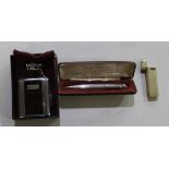 Cartier flip up lighter, gold plated marked with Paris, serial no. 39412G, Ronson pencilighters in