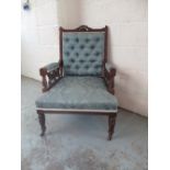 Victorian walnut framed nursing chair, deep buttoned back upholstered in pale blue damask type