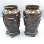 Pair of c20th Japanese bronze vases, tapering cylindrical bodies relief decorated with cranes in