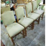 Late C20th set of four golden oak dining chairs, upholstered seat and back panels (4)