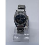 Services Super Calendar 1960's hand wound wristwatch with date, signed black dial with central