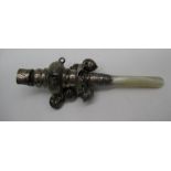 Late C19th/early C20th babies white metal teething rattle with mother of pearl teether, 1.42ozt