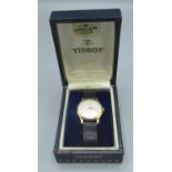 Tissot gold cased hand wound wristwatch, signed silvered dial with applied Arabic numerals and