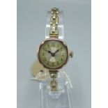 Swiss, C20th ladies 9ct gold cased hand wound wristwatch with two tone silvered Arabic dial, three