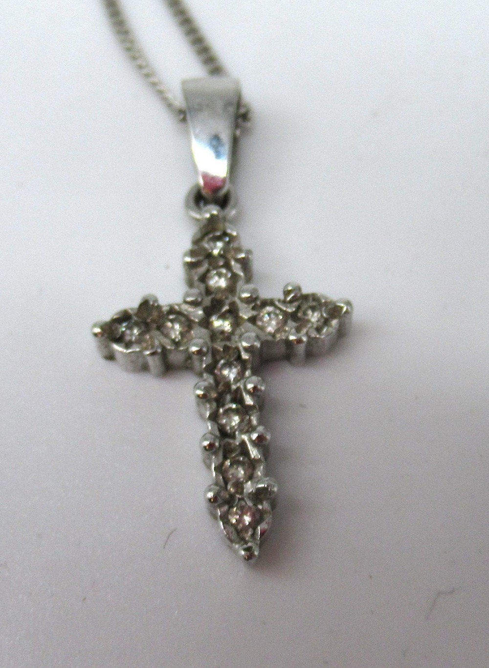 9ct white gold crucifix necklace set with diamonds, on 9ct white gold chain, both stamped 375, a - Image 3 of 5