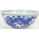 Late C18th Chinese Qianlong porcelain bowl painted in underglaze blue with dragons and foliage, four