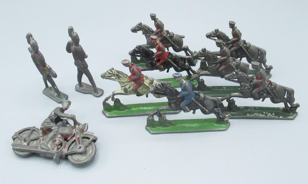 Collection of early C20th flat painted cast lead alloy mounted Cavalry in various Regimental