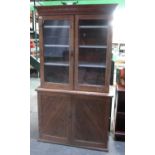 Victorian pitch pine side cabinet with two glass doors and three shelves above two panel doors on