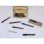 Australian Snorkel burgundy pen with original box, hallmarked silver propelling pencil, other