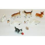 Beswick animal figures: two swans, cygnet, corgi, kitten, and three other ceramic figures (8)