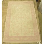 As new Laura Ashley Malmaison cotton and wool rug in blush pink, 120cm x 180cm