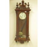Late c19th continental walnut cased double weight Vienna wall clock, with carved pediment and glazed