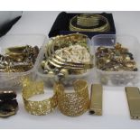 Large collection of costume jewellery including earrings, brooches, necklaces, synthetic pearls etc.