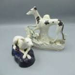 19th C Staffordshire pen holder in the form of a seated greyhound with crossed paws, another