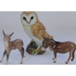 Beswick standing Donkey model 950, another Beswick Donkey and a Beswick Barn owl model 1046 (3)