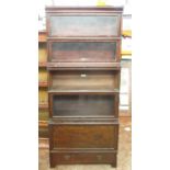 C20th Globe-Wernicke oak bookcase with four glazed and one solid panel fronted tiers, single