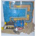 Collection of Corgi plastic road track with petrol station, cardboard road layout, car lift, etc (