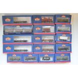 Sixteen boxed Bachmann branch line OO gauge railway wagons