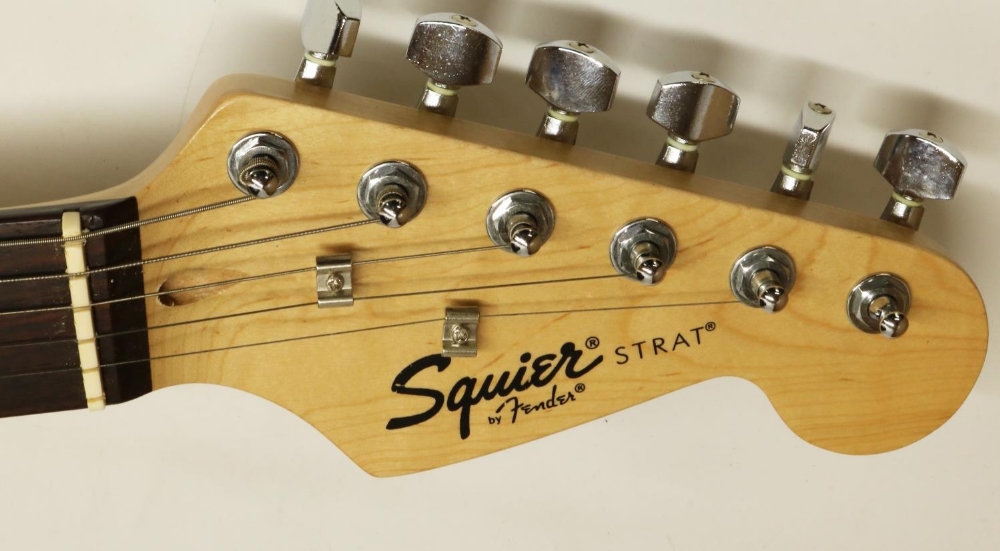 Fender Squier Strat. electric guitar, sunburst finish, and Squier SP.10 230v practice amp, in - Image 2 of 3