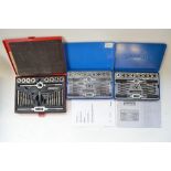 Collection of handheld workshop tools including 3 tap and die sets, hole saw, Como drill with