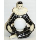 Late C20th composition figural table lamp base modelled as a seated Pierrot clown, with globe shade,