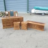 Contemporary pine bedroom suite comprising; long chest of four short and four long drawers, with