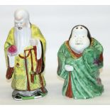 C20th Chinese Shouxing porcelain deity figure modelled as an old man in yellow robe carrying a