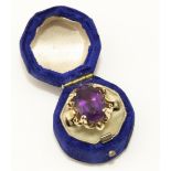 Late C20th 9ct yellow gold ring set with oval cut amethyst, stamped 375, M1/2, 5.0g